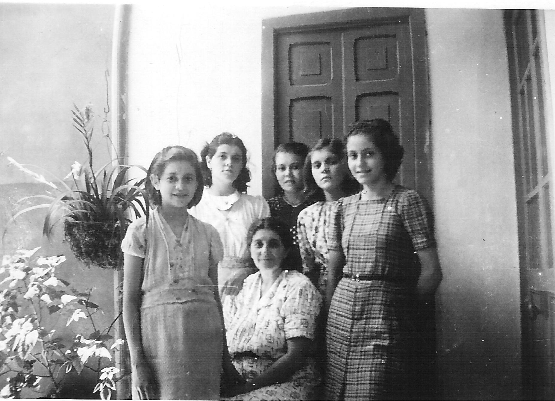 A Picture of my grandmother, my mother and several aunts
